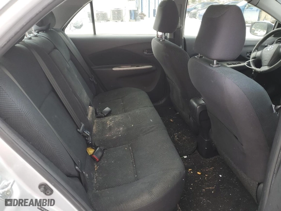 2011 Toyota Yaris with VIN JTDBT4K37B1401590, listed as a Copart auction lot 46142555 with 165,082 mi miles and Salvage Title. Bid and sale history available at carsss.com. Image 10.