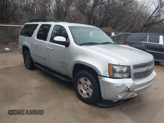 2014 Chevrolet Suburban LS with VIN 1GNSCHE08ER217393, listed as a IAAI auction lot 41563635 with 212,852 mi miles. Bid and sale history available at carsss.com. Image 1.