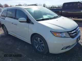 2014 Honda Odyssey Touring with VIN 5FNRL5H91EB015856, listed as a IAAI auction lot 41930232 with 193,841 mi miles and . Bid and sale history available at carsss.com. Image 1.