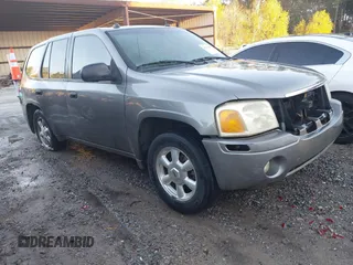 2005 GMC Envoy SLE with VIN 1GKDS13S352215032, listed as a IAAI auction lot 41221612 with 260,647 mi miles and . Bid and sale history available at DreamBid. Image 1.