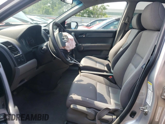 2009 Honda CR-V LX z VIN 5J6RE383X9L035529, wystawiony jako Copart lot #57875445 z przebiegiem 122 651 mil mil oraz Szkoda całkowita • Salvage title. Historia ofert i sprzedaży dostępna na DreamBid. Obrazek 7.