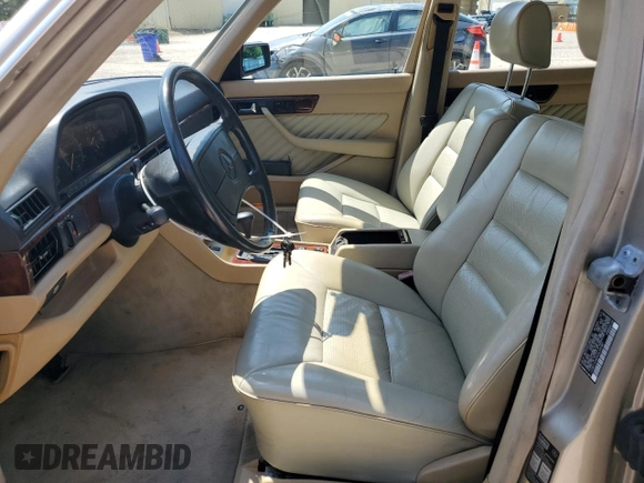 1991 Mercedes-Benz 560 with VIN WDBCA39E9MA599487, listed as a Copart auction lot 51921915 with 59,132 mi miles and Salvage Title. Bid and sale history available at DreamBid. Image 7.