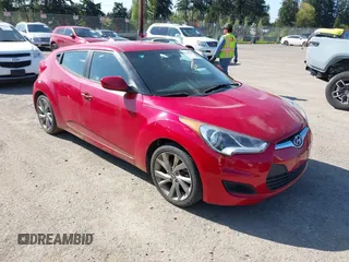 2016 Hyundai Veloster with VIN KMHTC6AD2GU284741, listed as a IAAI auction lot 42108919 with 162,616 mi miles. Bid and sale history available at carsss.com. Image 1.