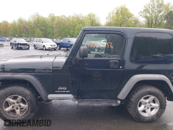2004 Jeep Wrangler X with VIN 1J4FA39S94P707411, listed as a IAAI auction lot 42187856 with 189,519 mi miles. Bid and sale history available at carsss.com. Image 14.