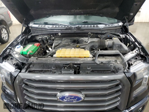 2016 Ford F-150 XLT with VIN 1FTEW1EG7GFD16079, listed as a Copart auction lot 58512935 with 112,522 mi miles and Salvage title. Bid and sale history available at DreamBid. Image 11.