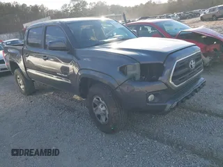 2016 Toyota Tacoma SR5 z VIN 3TMAZ5CN6GM020176, wystawiony jako IAAI lot #41404056 z przebiegiem 109 033 mil mil oraz . Historia ofert i sprzedaży dostępna na DreamBid. Obrazek 1.