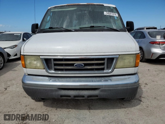 2005 Ford Econoline Passenger XL with VIN 1FBNE31L55HA98845, listed as a Copart auction lot 74541374 with Not Provided miles and Non Repairable. Bid and sale history available at carsss.com. Image 5.