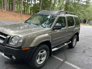 2004 Nissan Xterra XE with VIN 5N1ED28Y44C656024, listed as a Copart auction lot 61629985 with 216,348 mi miles and Clean title. Bid and sale history available at DreamBid. Image 2.