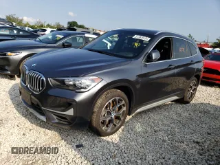 2021 BMW X1 xDrive28i with VIN WBXJG9C09M5T96327, listed as a Copart auction lot 49876493 with 42,572 mi miles. Bid and sale history available at carsss.com. Image 1.