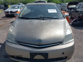 2006 Toyota Prius with VIN JTDKB20U667543726, listed as a IAAI auction lot 42101090 with 196,358 mi miles. Bid and sale history available at carsss.com. Image 6.