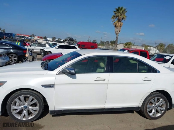 2015 Ford Taurus Limited with VIN 1FAHP2F80FG144421, listed as a IAAI auction lot 41947787 with 143,496 mi miles. Bid and sale history available at carsss.com. Image 14.
