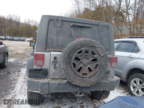 2014 Jeep Wrangler Unlimited Sport with VIN 1C4HJWDG1EL302087, listed as a IAAI auction lot 41420740 with 152,096 mi miles. Bid and sale history available at carsss.com. Image 17.