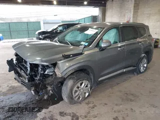 2019 Hyundai Santa Fe SE with VIN 5NMS2CAD7KH094144, listed as a IAAI auction lot 41984633 with 46,307 mi miles and . Bid and sale history available at DreamBid. Image 2.