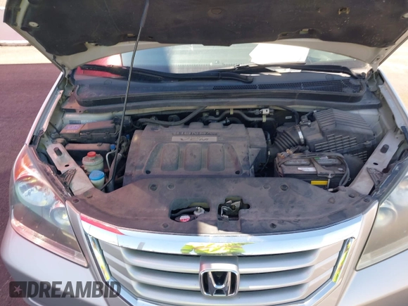 2008 Honda Odyssey EX-L with VIN 5FNRL38758B008724, listed as a IAAI auction lot 42202383 with 199,977 mi miles and . Bid and sale history available at DreamBid. Image 10.