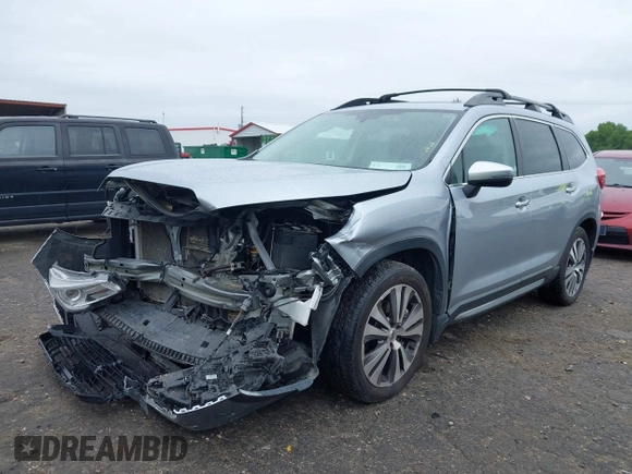 2021 Subaru Ascent Touring with VIN 4S4WMARD3M3465396, listed as a IAAI auction lot 42354850 with 94,783 mi miles and . Bid and sale history available at DreamBid. Image 2.