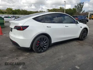 2022 Tesla Model Y Performance with VIN 7SAYGDEFXNF510418, listed as a Copart auction lot 51131465 with 16,263 mi miles and Salvage Title. Bid and sale history available at DreamBid. Image 3.