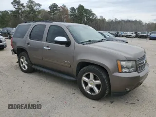 2011 Chevrolet Tahoe LS with VIN 1GNSCAE09BR138852, listed as a Copart auction lot 49165595 with 207,548 mi miles and Salvage title. Bid and sale history available at DreamBid. Image 4.