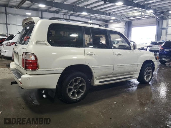2000 Lexus LX 470 z VIN JT6HT00W9Y0109333, wystawiony jako Copart lot #47589965 z przebiegiem 261 766 mil mil oraz Szkody całkowita. Historia ofert i sprzedaży dostępna na DreamBid. Obrazek 3.