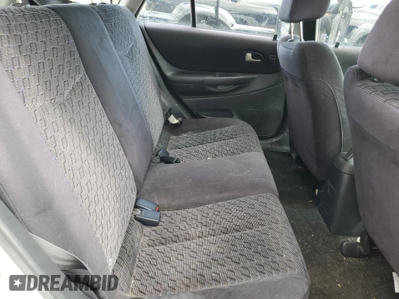 2002 Mazda Protege z VIN JM1BJ245721470434, wystawiony jako Copart lot #57293765 z przebiegiem 144 622 mil mil oraz Szkoda całkowita • Salvage title. Historia ofert i sprzedaży dostępna na DreamBid. Obrazek 10.