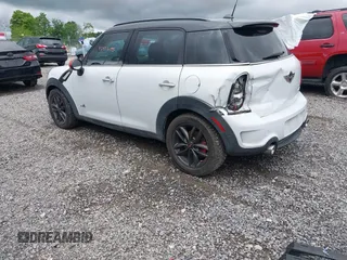 2012 MINI Countryman S z VIN WMWZC5C54CWL58610, wystawiony jako IAAI lot #42372195 z przebiegiem 133 556 mil mil oraz . Historia ofert i sprzedaży dostępna na DreamBid. Obrazek 3.