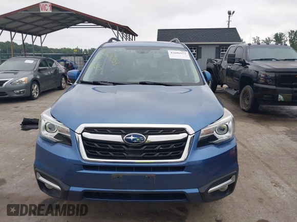 2018 Subaru Forester Touring with VIN JF2SJAWC6JH597365, listed as a IAAI auction lot 42606953 with 66,340 mi miles and . Bid and sale history available at DreamBid. Image 12.