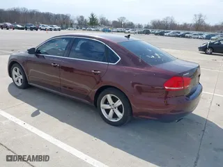 2012 Volkswagen Passat SE w/Sunroof with VIN 1VWBH7A31CC076037, listed as a IAAI auction lot 41905200 with 141,809 mi miles. Bid and sale history available at carsss.com. Image 3.