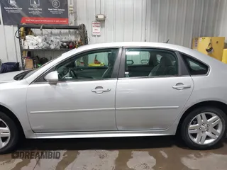 2014 Chevrolet Impala LT with VIN 2G1WB5E37E1178089, listed as a IAAI auction lot 42450127 with 58,277 mi miles and . Bid and sale history available at DreamBid. Image 14.