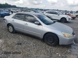 2003 Honda Accord LX with VIN 1HGCM563X3A144736, listed as a Copart auction lot 62928425 with 313,093 mi miles and Salvage title. Bid and sale history available at DreamBid. Image 4.