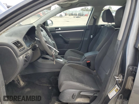 2009 Volkswagen Jetta S with VIN 3VWJM71K59M007776, listed as a Copart auction lot 53959525 with 190,557 mi miles and Salvage title. Bid and sale history available at DreamBid. Image 7.