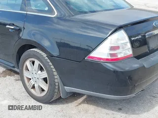 2008 Ford Taurus Limited with VIN 1FAHP28WX8G149284, listed as a IAAI auction lot 41530073 with 149,398 mi miles. Bid and sale history available at carsss.com. Image 13.