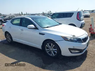2013 Kia Optima EX z VIN 5XXGN4A74DG258769, wystawiony jako IAAI lot #42598047 z przebiegiem 165 605 mil mil oraz . Historia ofert i sprzedaży dostępna na DreamBid. Obrazek 1.