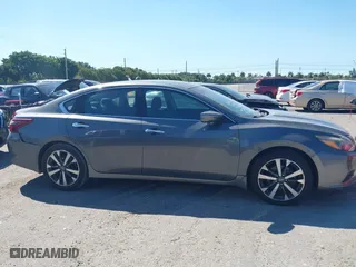 2017 Nissan Altima 2.5 SR with VIN 1N4AL3APXHC142963, listed as a IAAI auction lot 41849533 with 51,237 mi miles. Bid and sale history available at carsss.com. Image 13.