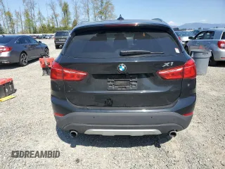 2017 BMW X1 xDrive28i with VIN WBXHT3C32H5F82141, listed as a Copart auction lot 53311785 with 52,867 mi miles and Salvage Title. Bid and sale history available at carsss.com. Image 6.