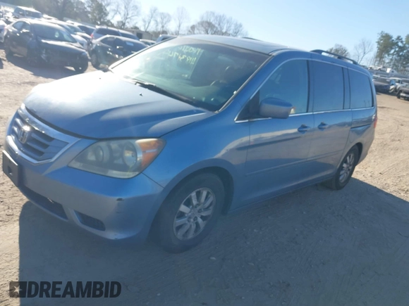 2010 Honda Odyssey EX-L with VIN 5FNRL3H77AB096732, listed as a IAAI auction lot 41831744 with 22,523 mi miles and . Bid and sale history available at DreamBid. Image 2.