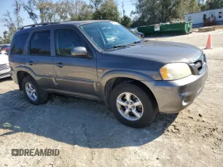 2006 Mazda Tribute S with VIN 4F2YZ041X6KM24035, listed as a Copart auction lot 45943285 with 105,040 mi miles and Salvage Title. Bid and sale history available at DreamBid. Image 4.
