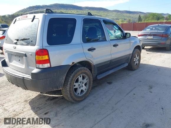2006 Ford Escape XLT with VIN 1FMYU93126KC36402, listed as a IAAI auction lot 42122882 with 192,899 mi miles and . Bid and sale history available at DreamBid. Image 4.