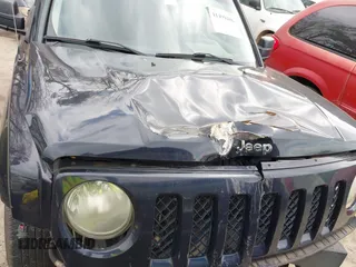 2011 Jeep Patriot Latitude with VIN 1J4NT1GB5BD140710, listed as a IAAI auction lot 41499486 with 182,809 mi miles. Bid and sale history available at carsss.com. Image 13.