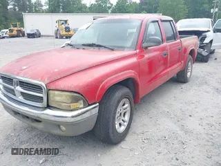 2004 Dodge Dakota SLT with VIN 1D7HL48N84S717599, listed as a IAAI auction lot 42132810 with 305,900 mi miles and . Bid and sale history available at carsss.com. Image 2.