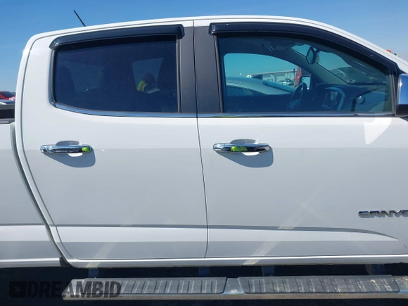 2015 GMC Canyon 2WD SLT with VIN 1GTG5CE36F1151433, listed as a IAAI auction lot 41636107 with 117,682 mi miles. Bid and sale history available at carsss.com. Image 13.