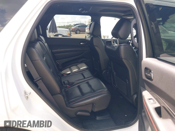 2023 Dodge Durango GT Plus with VIN 1C4RDJDG4PC688294, listed as a IAAI auction lot 42732273 with 63,384 mi miles and . Bid and sale history available at DreamBid. Image 8.