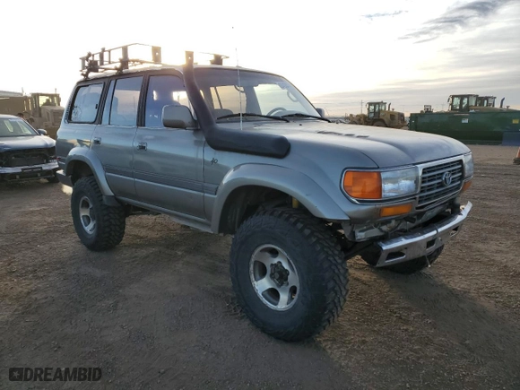 1997 Toyota Land Cruiser with VIN JT3HJ85J3V0170784, listed as a Copart auction lot 83493574 with 314,737 mi miles and Salvage Title. Bid and sale history available at carsss.com. Image 4.
