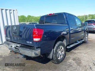2007 Nissan Titan SE z VIN 1N6BA07B77N214250, wystawiony jako IAAI lot #42142029 z przebiegiem 184 575 mil mil oraz . Historia ofert i sprzedaży dostępna na DreamBid. Obrazek 4.