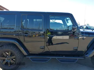 2014 Jeep Wrangler Unlimited Sahara with VIN 1C4BJWEG0EL306202, listed as a IAAI auction lot 41784330 with 79,123 mi miles. Bid and sale history available at carsss.com. Image 13.