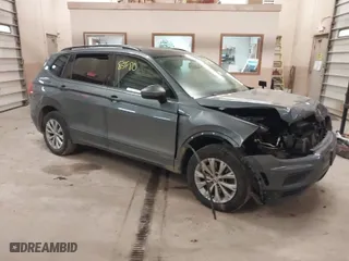 2019 Volkswagen Tiguan S with VIN 3VV0B7AX5KM180611, listed as a IAAI auction lot 41785980 with 169,203 mi miles. Bid and sale history available at carsss.com. Image 1.