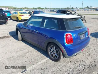 2019 MINI Hardtop Cooper with VIN WMWXP5C52K2H97728, listed as a IAAI auction lot 42026666 with 61,464 mi miles and . Bid and sale history available at DreamBid. Image 3.