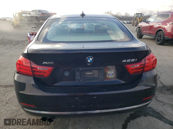2015 BMW 4 Series 428i xDrive with VIN WBA4C9C57FG135476, listed as a Copart auction lot 82427893 with 76,405 mi miles and . Bid and sale history available at DreamBid. Image 6.