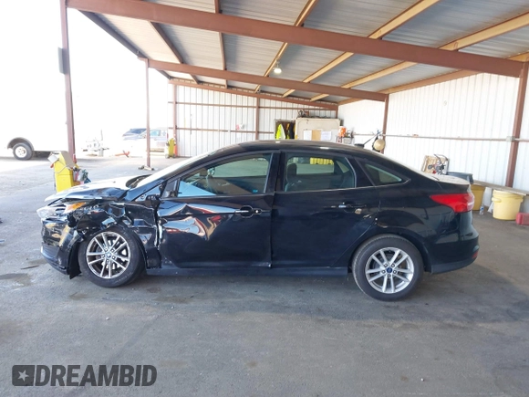 2017 Ford Focus SE with VIN 1FADP3F26HL219875, listed as a IAAI auction lot 41756026 with 70,493 mi miles. Bid and sale history available at carsss.com. Image 14.
