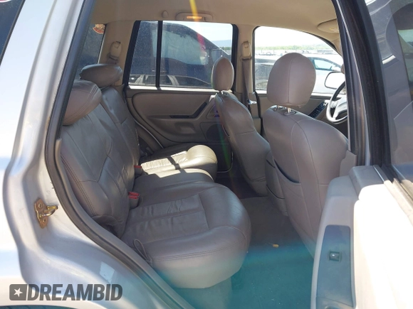 2002 Jeep Grand Cherokee Laredo with VIN 1J4GX48S52C249574, listed as a IAAI auction lot 42458883 with 89,028 mi miles and . Bid and sale history available at DreamBid. Image 8.