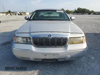 2000 Mercury Grand Marquis GS z VIN 2MEFM74W0YX715104, wystawiony jako Copart lot #54357855 z przebiegiem 111 231 mil mil oraz Szkoda całkowita • Salvage title. Historia ofert i sprzedaży dostępna na DreamBid. Obrazek 5.