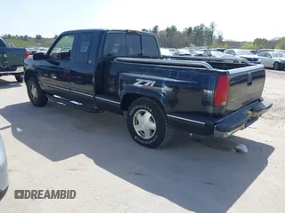 1997 Chevrolet Silverado 1500 with VIN 2GCEK19R3V1159386, listed as a IAAI auction lot 42159684 with 98,577 mi miles and . Bid and sale history available at DreamBid. Image 3.